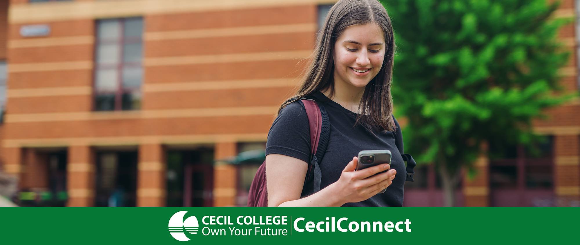 Student using their mobile phone.